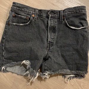 Black Levi’s cutoff shorts